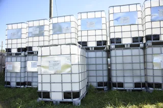 330-gallon caged IBC tote examples in the Bulk photo library